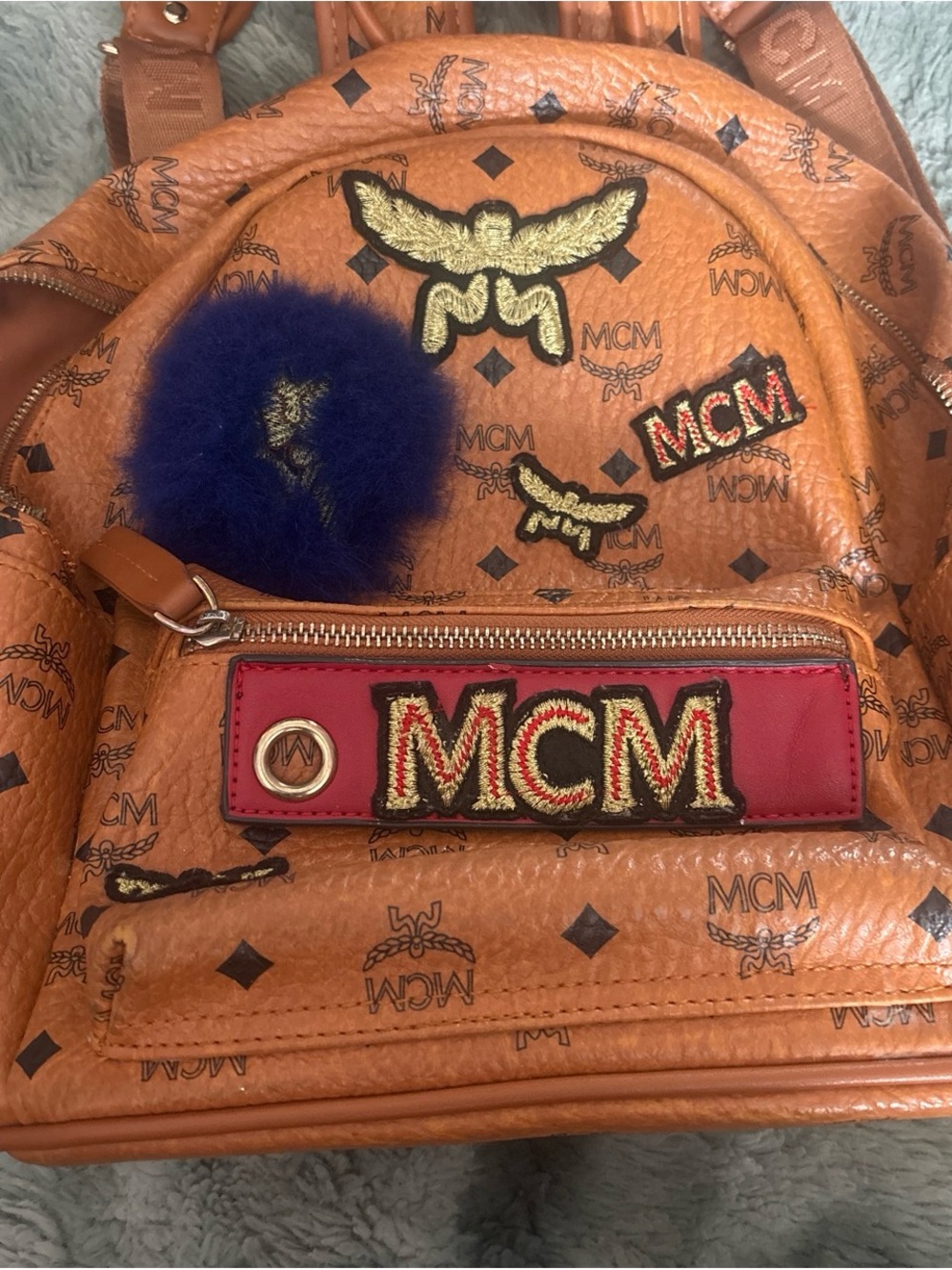 MCM Cognac Logo Patch Mini Backpack with Red and Blue Accents